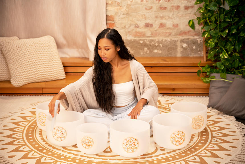 Meinl SOLCSBSET Solfeggio crystal singing bowl set – being played indoors