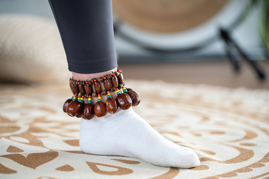 MEINL Sonic Energy Pala bracelet SPB with brown seed shells, on an ankle