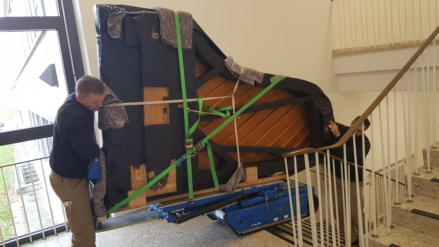 Premium Lieferservice bis in die Wohnung mit Aufbau + Entsorgung der Transportverpackung - Musik-Ebert Gmbh