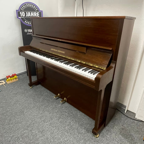 GROTRIAN-STEINWEG Klavier 122 K Occasion Nussbaum sehr guter Zustand Bj. 1985 (gebraucht) - Musik-Ebert Gmbh