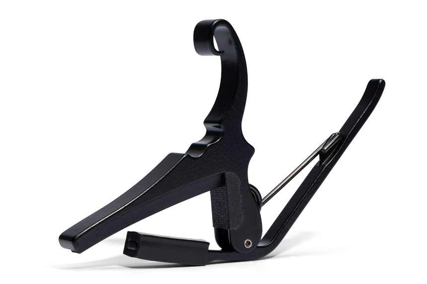 Black Kyser KG6LTA low-tension acoustic guitar capo – rear view on white.