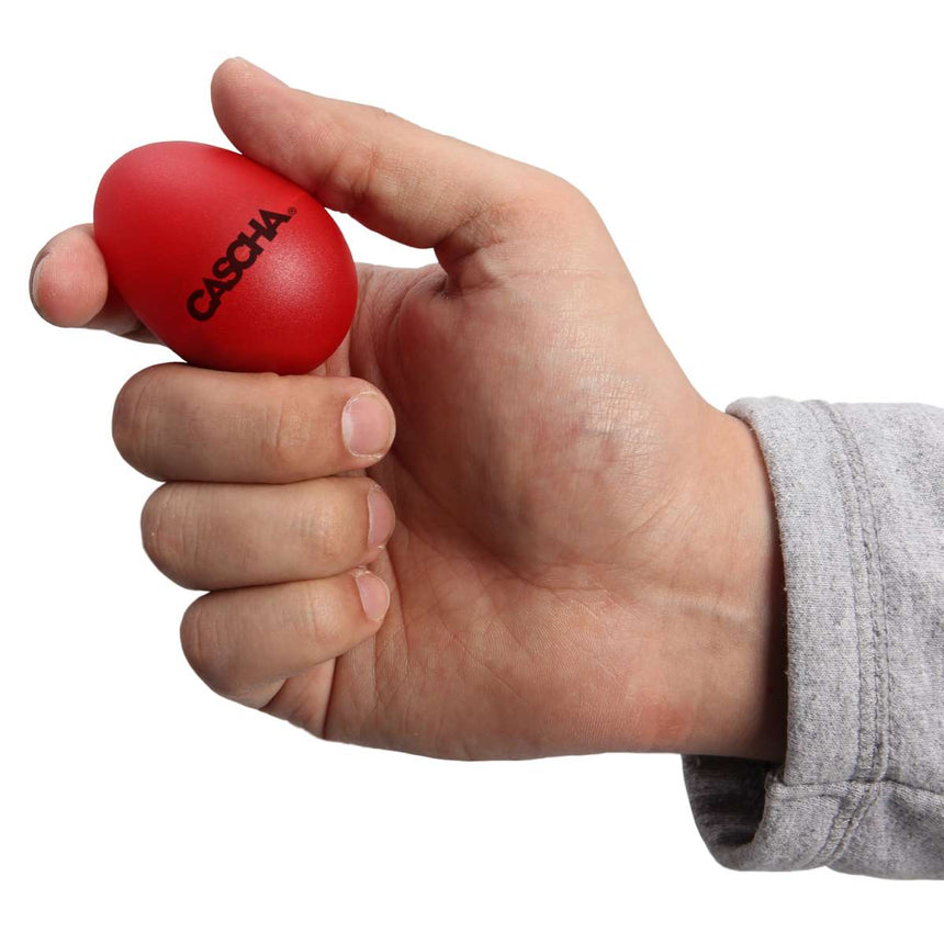 Red egg shaker from the Cascha HH-2003 set held in a hand